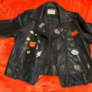 Leather jacket with patches